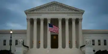 Supreme Court building exterior at dusk, symbolizing judicial power and new appointments.
